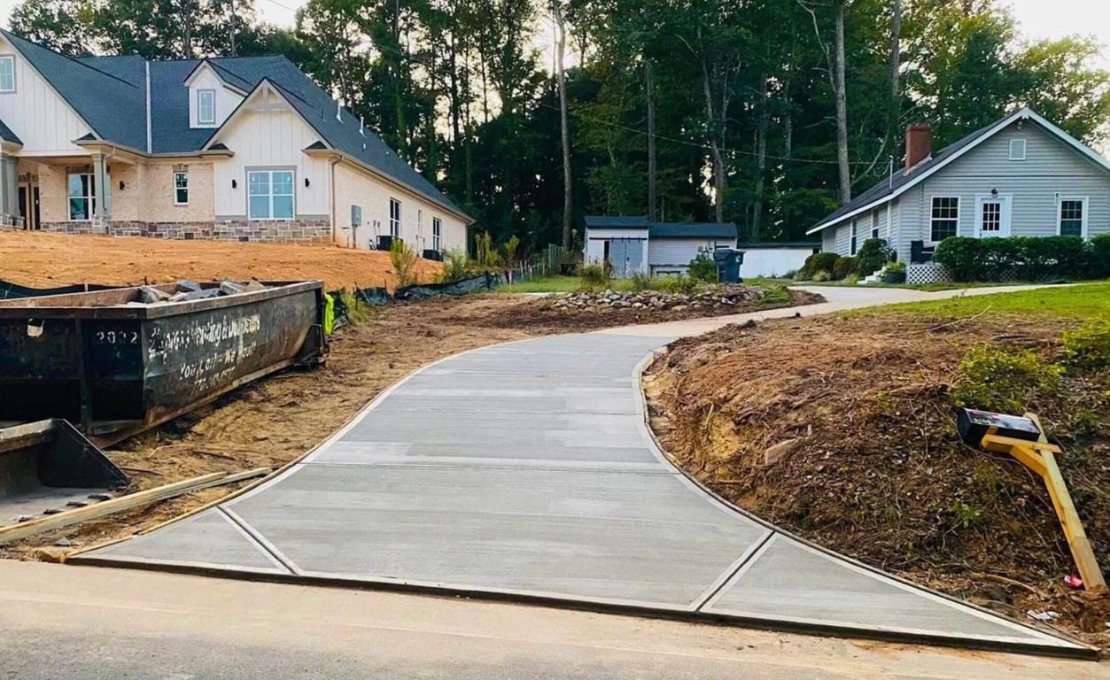 Newly poured concrete driveway for residential home in Norwalk, CA